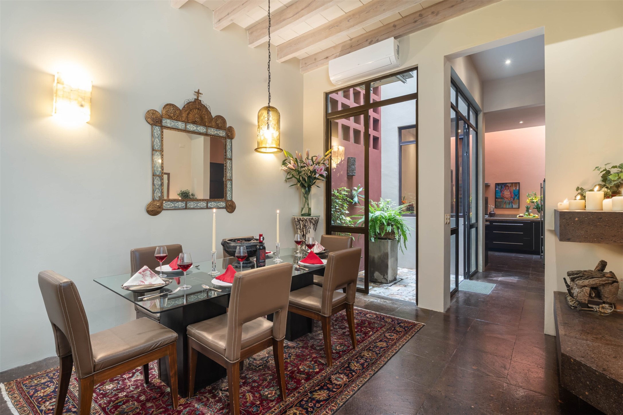 35 Quebrada undefined, undefined 00000 - Photo 19 of 41 The formal dining room fronts a second smaller courtyard that separates it from a spacious skylit kitchen