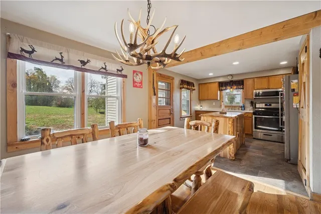 a view of kitchen with furniture and window
