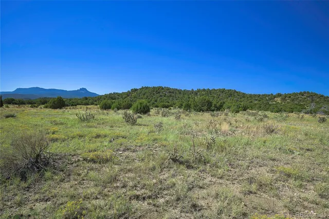a view of mountain with outdoor space