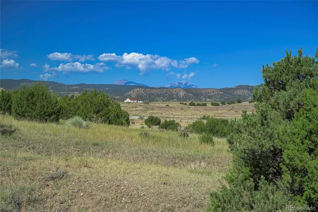 a view of a lake with mountains in the background
