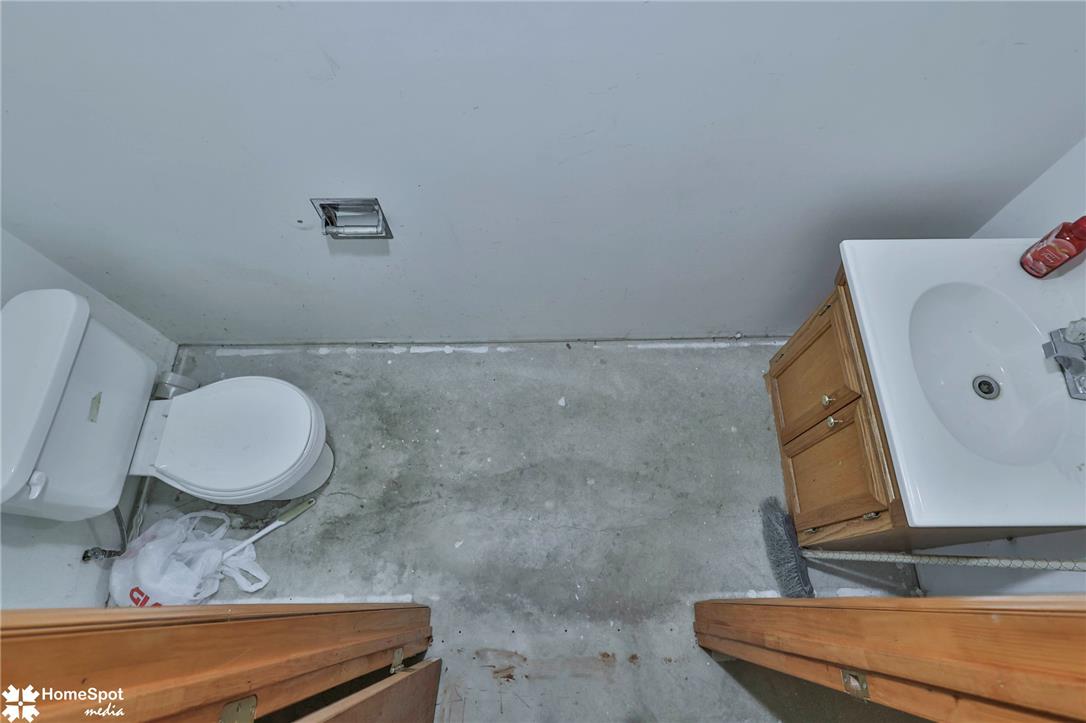 829 Georgetown Road Nazareth, PA 18064 - Photo 37 of 54 Concrete flooring and simple fixtures define this utility bathroom awaiting customization.