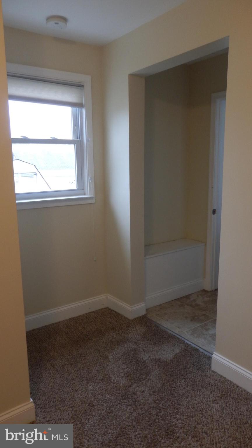 140 Meadow Road Pasadena, MD 21122 - Photo 30 of 53 LAUNDRY ROOM LEADING TO BATH AND GARAGE