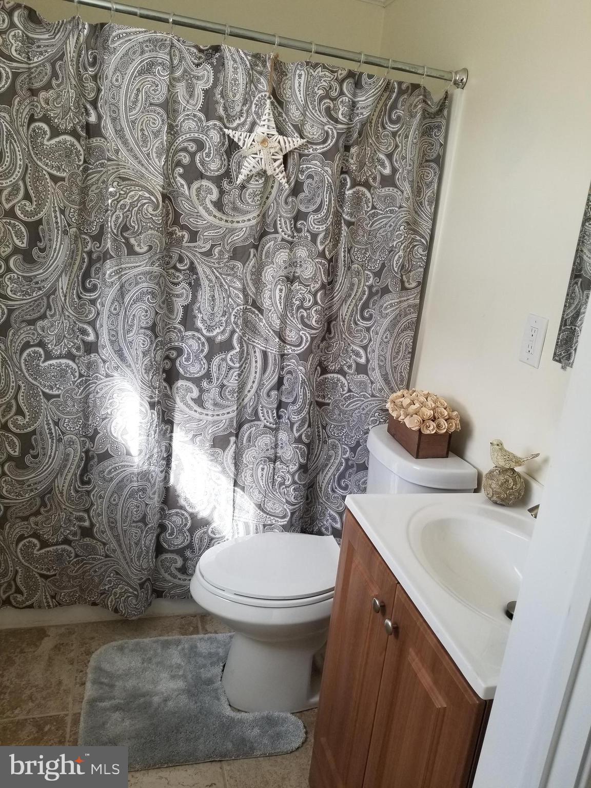 140 Meadow Road Pasadena, MD 21122 - Photo 39 of 53 FULL BATH MAIN LEVEL