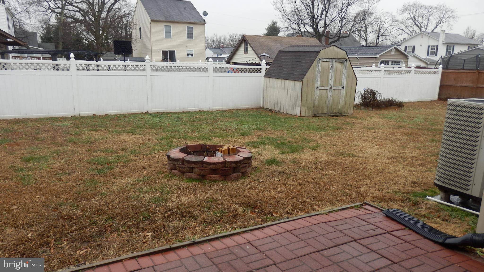 140 Meadow Road Pasadena, MD 21122 - Photo 53 of 53 FENCED REAR YARD WITH FIREPIT