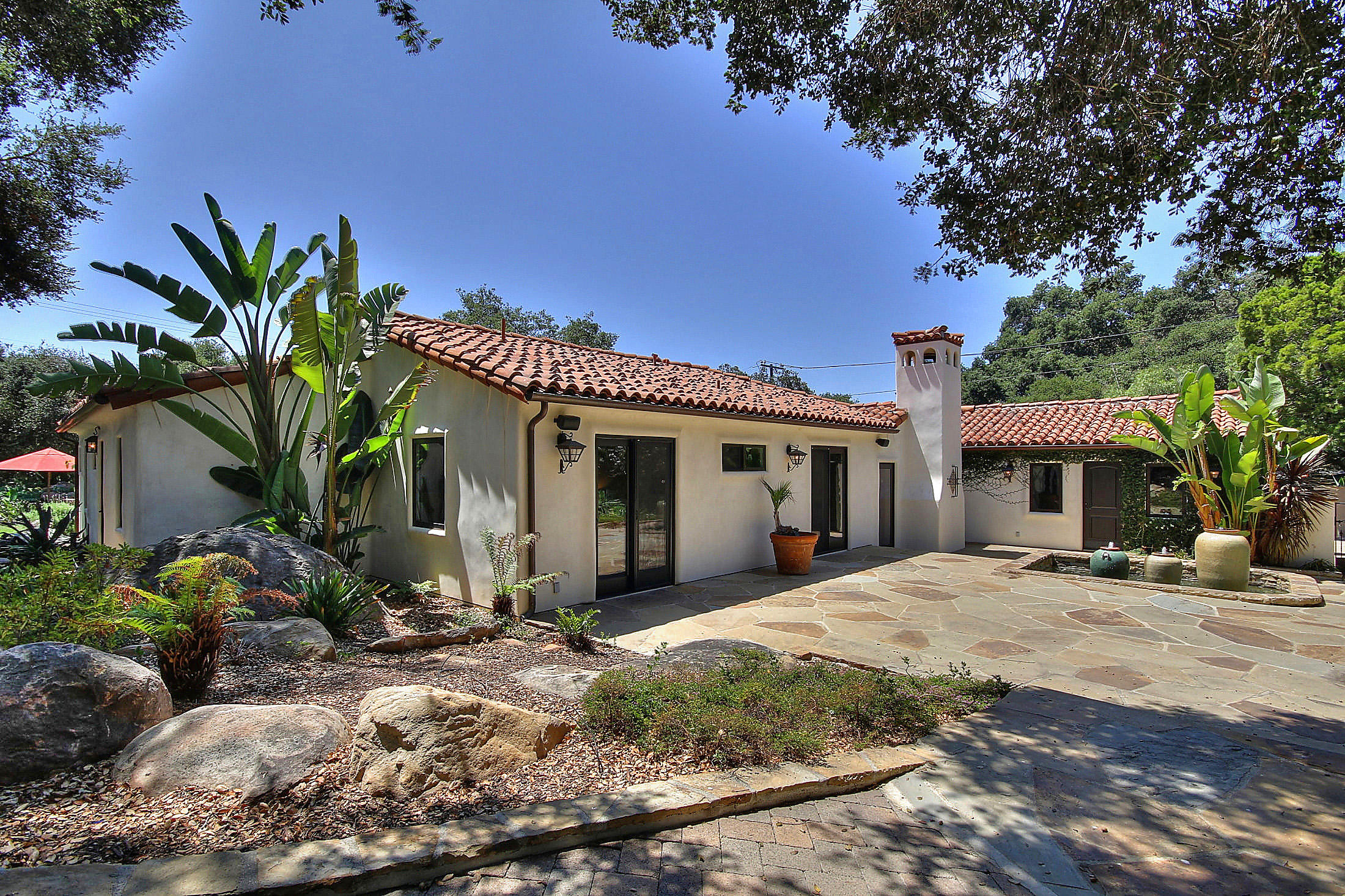 2540 Foothill Road Santa Barbara, CA 93105 - Photo 13 of 45 a front view of a house with a garden
