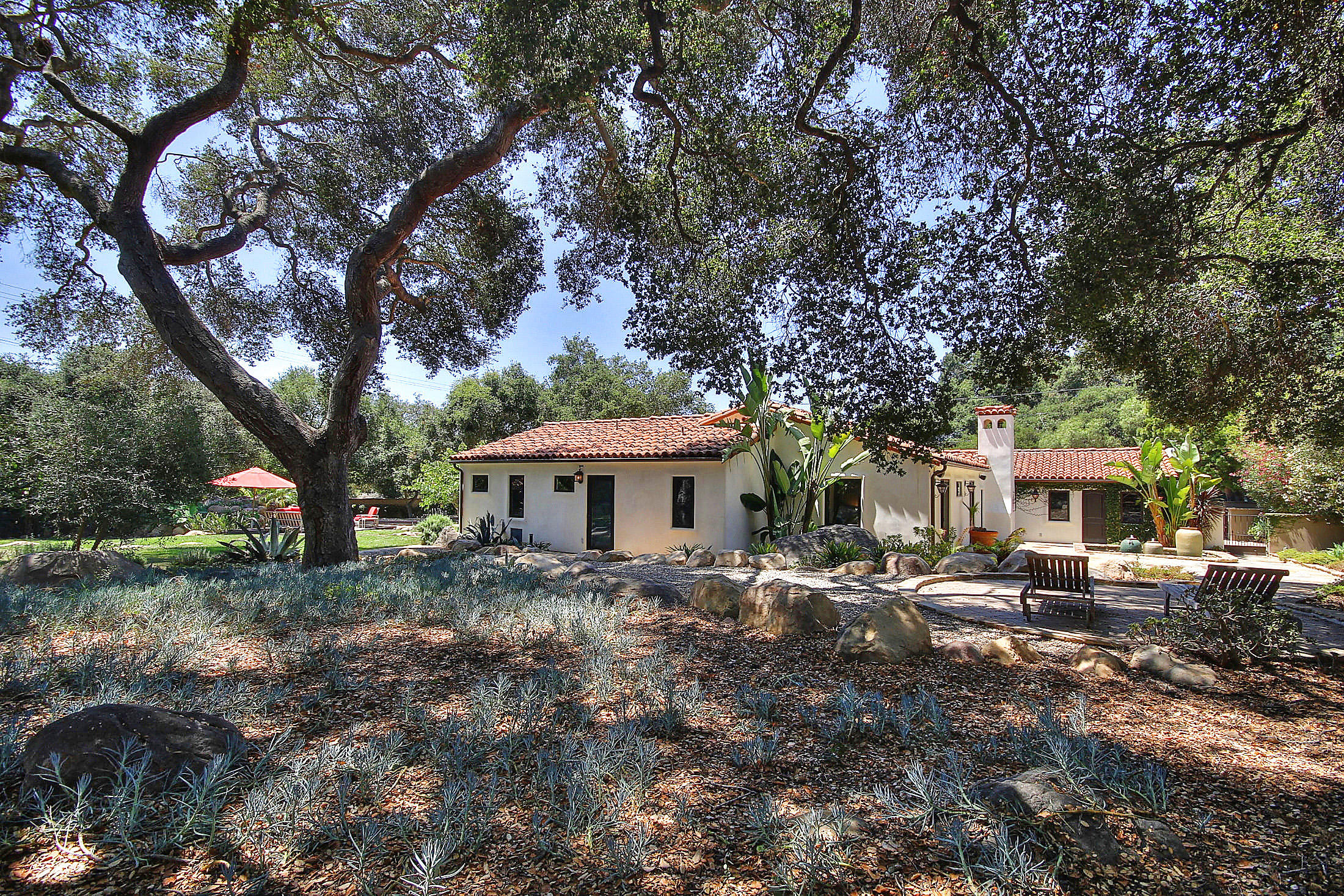 2540 Foothill Road Santa Barbara, CA 93105 - Photo 14 of 45 a front view of a house with garden