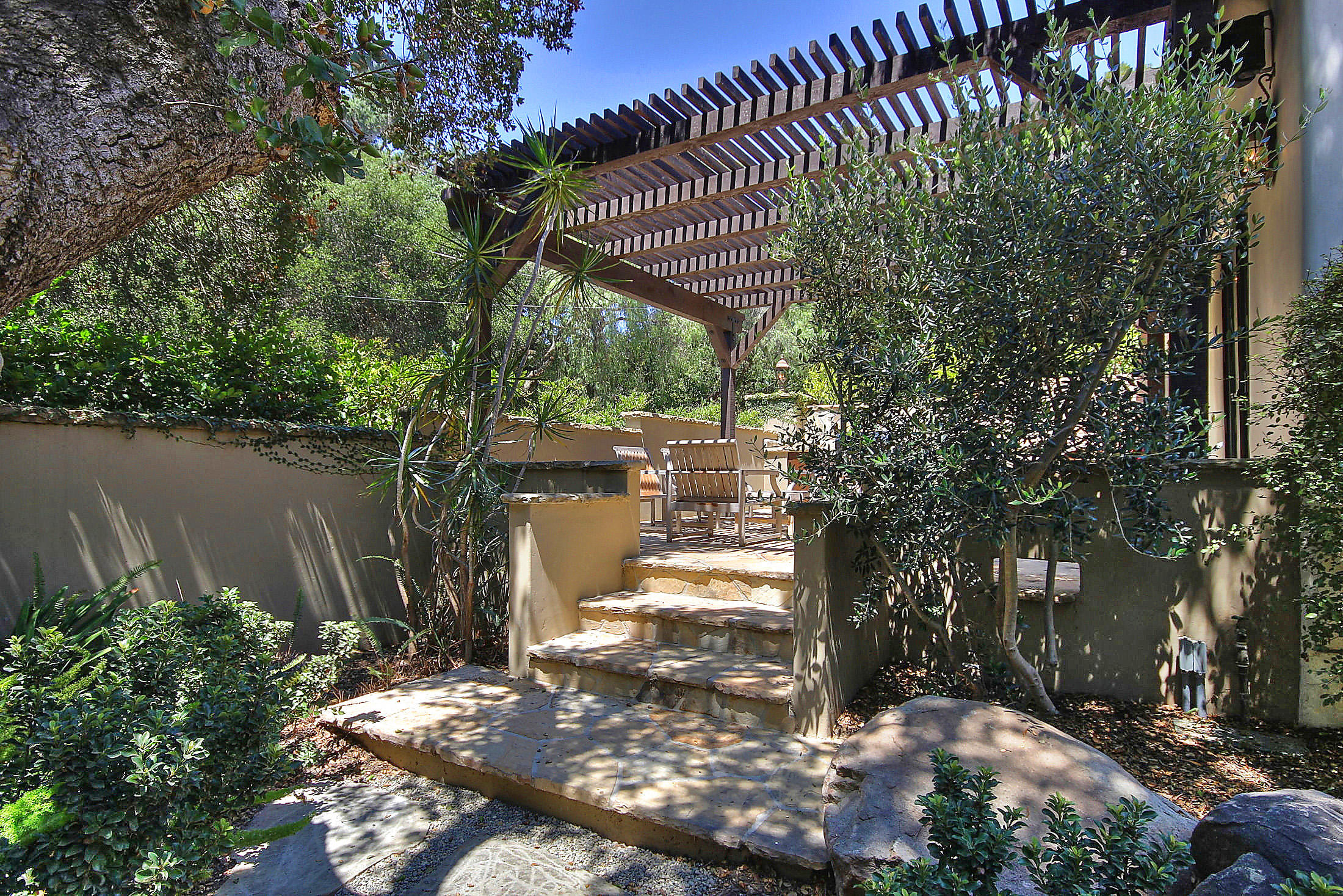 2540 Foothill Road Santa Barbara, CA 93105 - Photo 17 of 45 a view of a yard with plants and trees