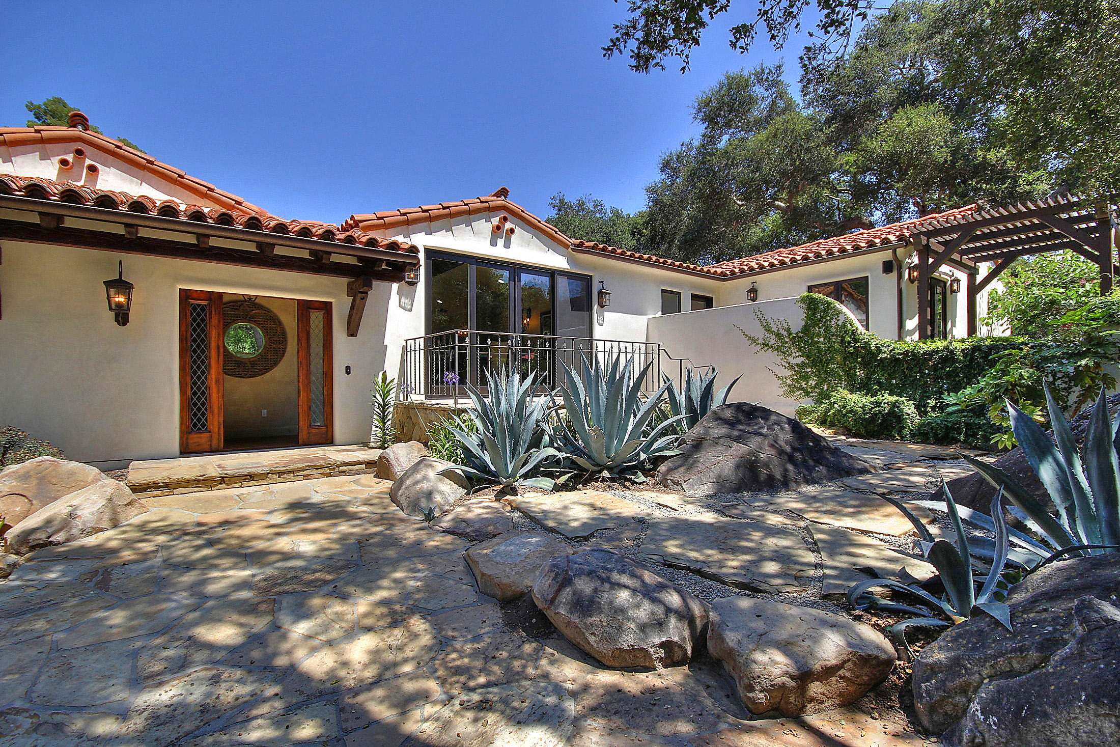 2540 Foothill Road Santa Barbara, CA 93105 - Photo 2 of 45 a front view of a house with a yard