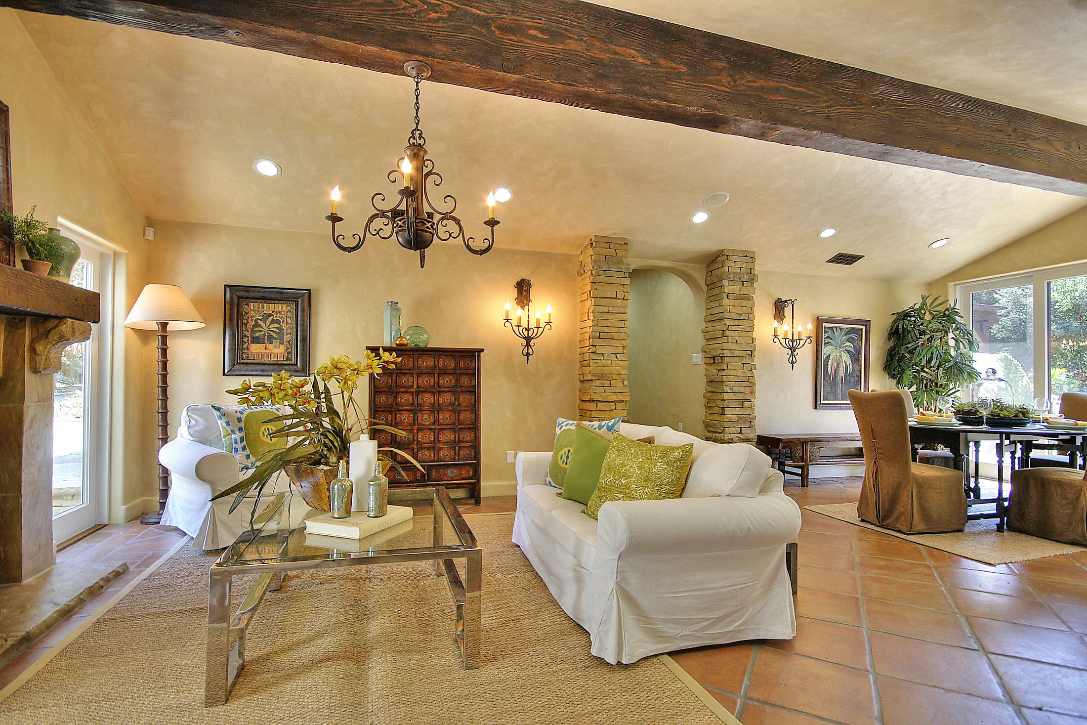 2540 Foothill Road Santa Barbara, CA 93105 - Photo 23 of 45 a living room with lots of furniture and chandelier
