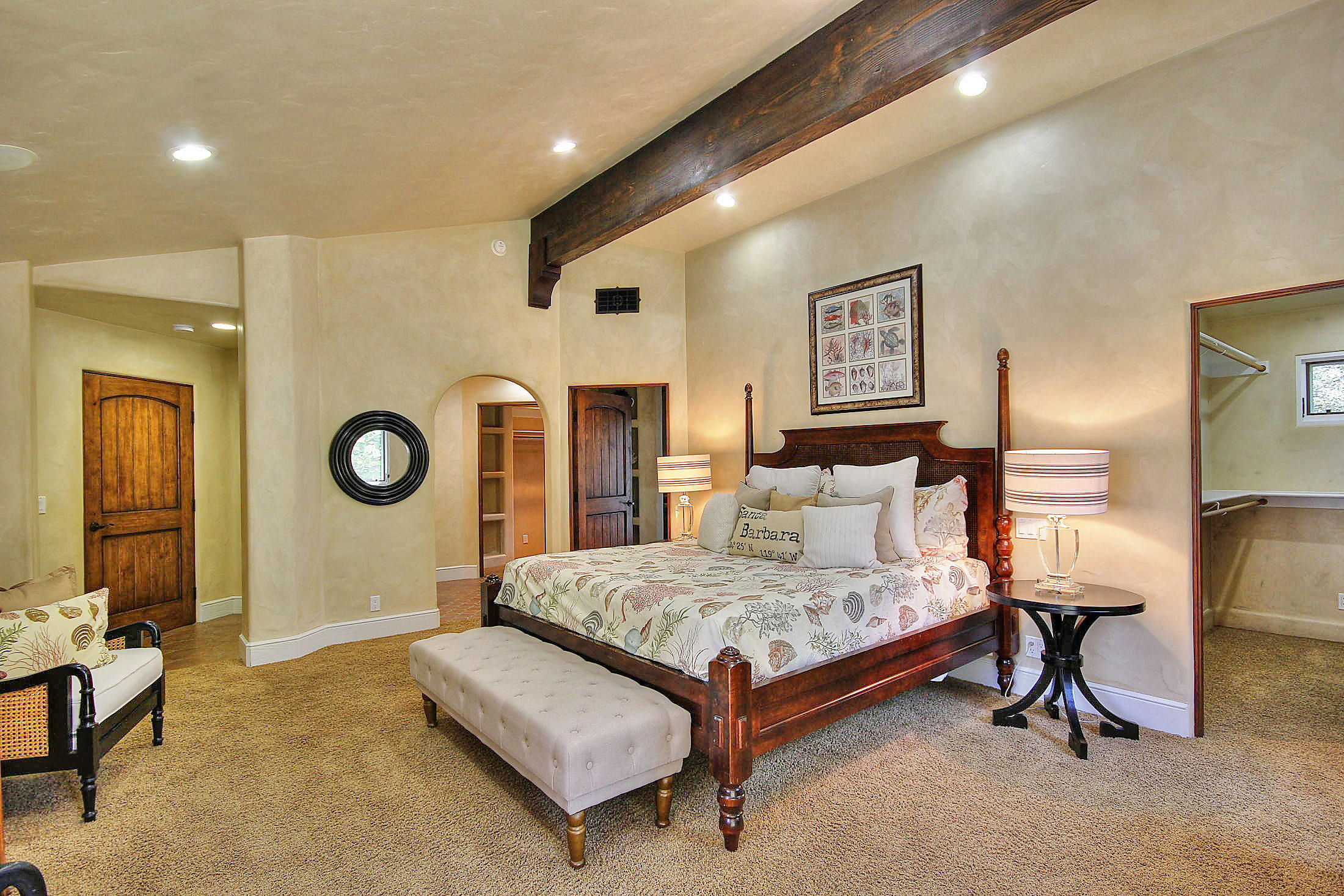 2540 Foothill Road Santa Barbara, CA 93105 - Photo 30 of 45 a bedroom with a bed and a mirror