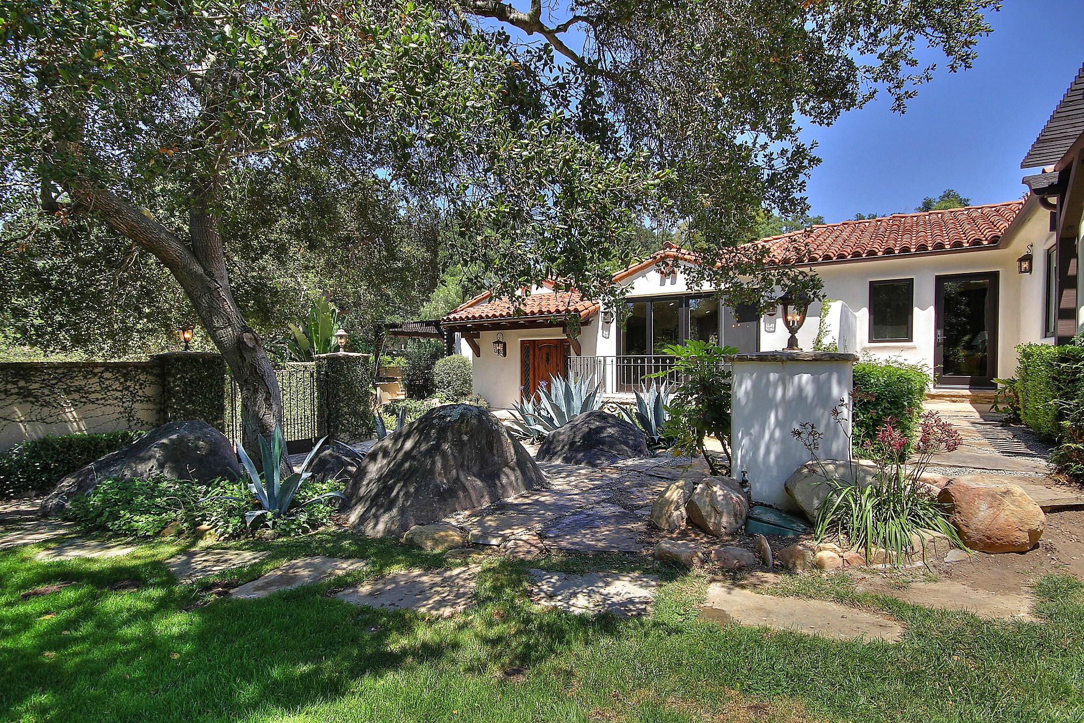 2540 Foothill Road Santa Barbara, CA 93105 - Photo 3 of 45 a front view of house with a garden