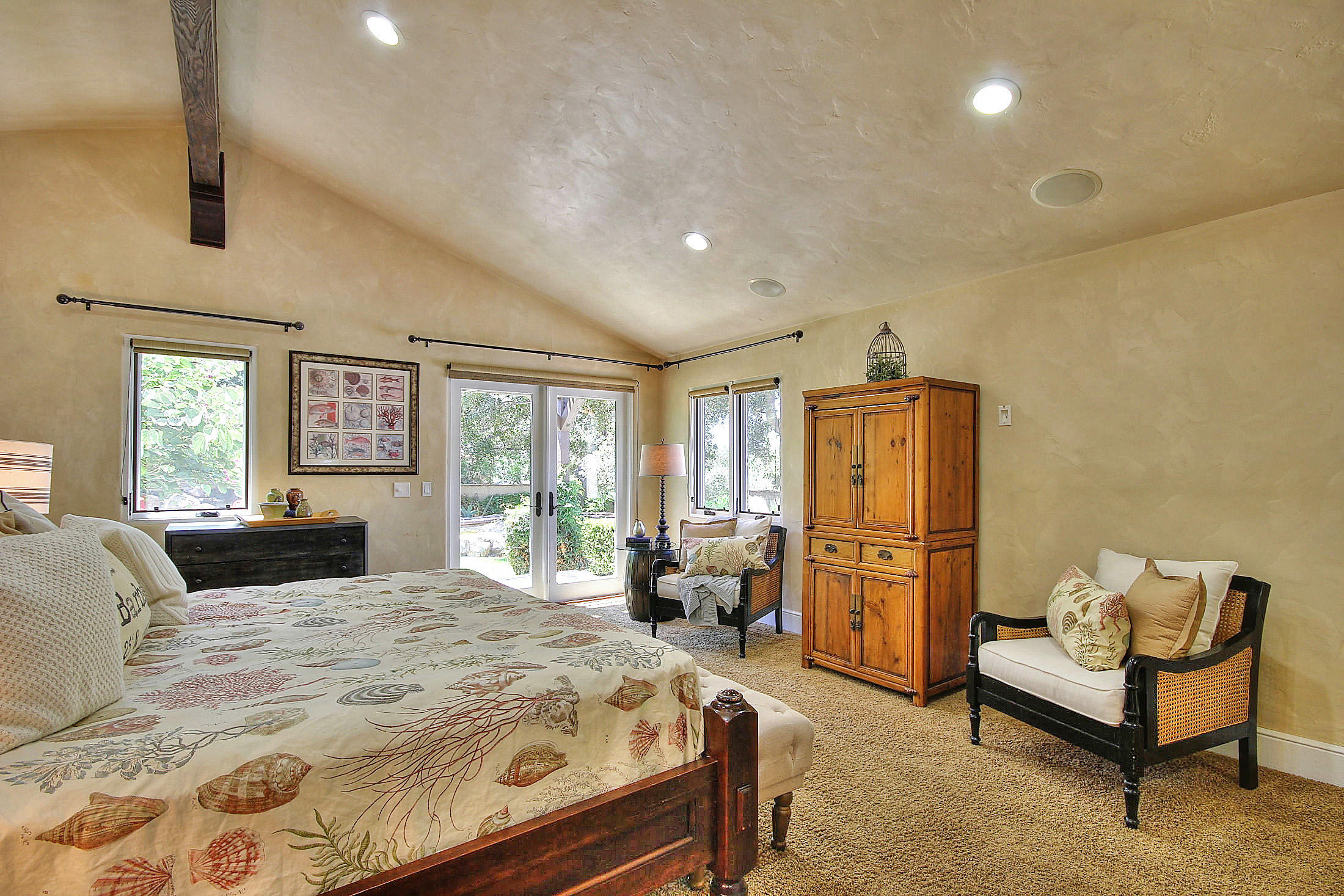 2540 Foothill Road Santa Barbara, CA 93105 - Photo 31 of 45 a bedroom with a bed a couch and dresser