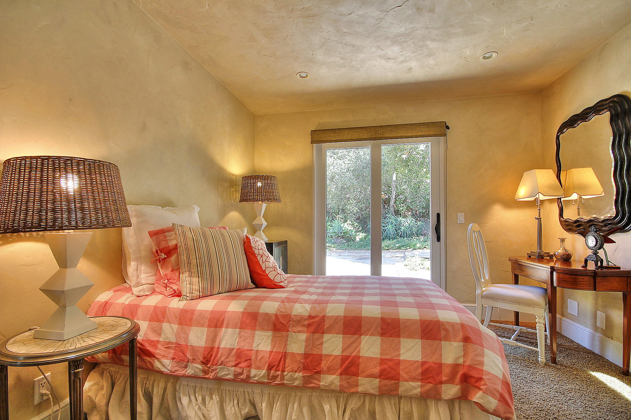 2540 Foothill Road Santa Barbara, CA 93105 - Photo 40 of 45 a bedroom with a bed and wooden floor