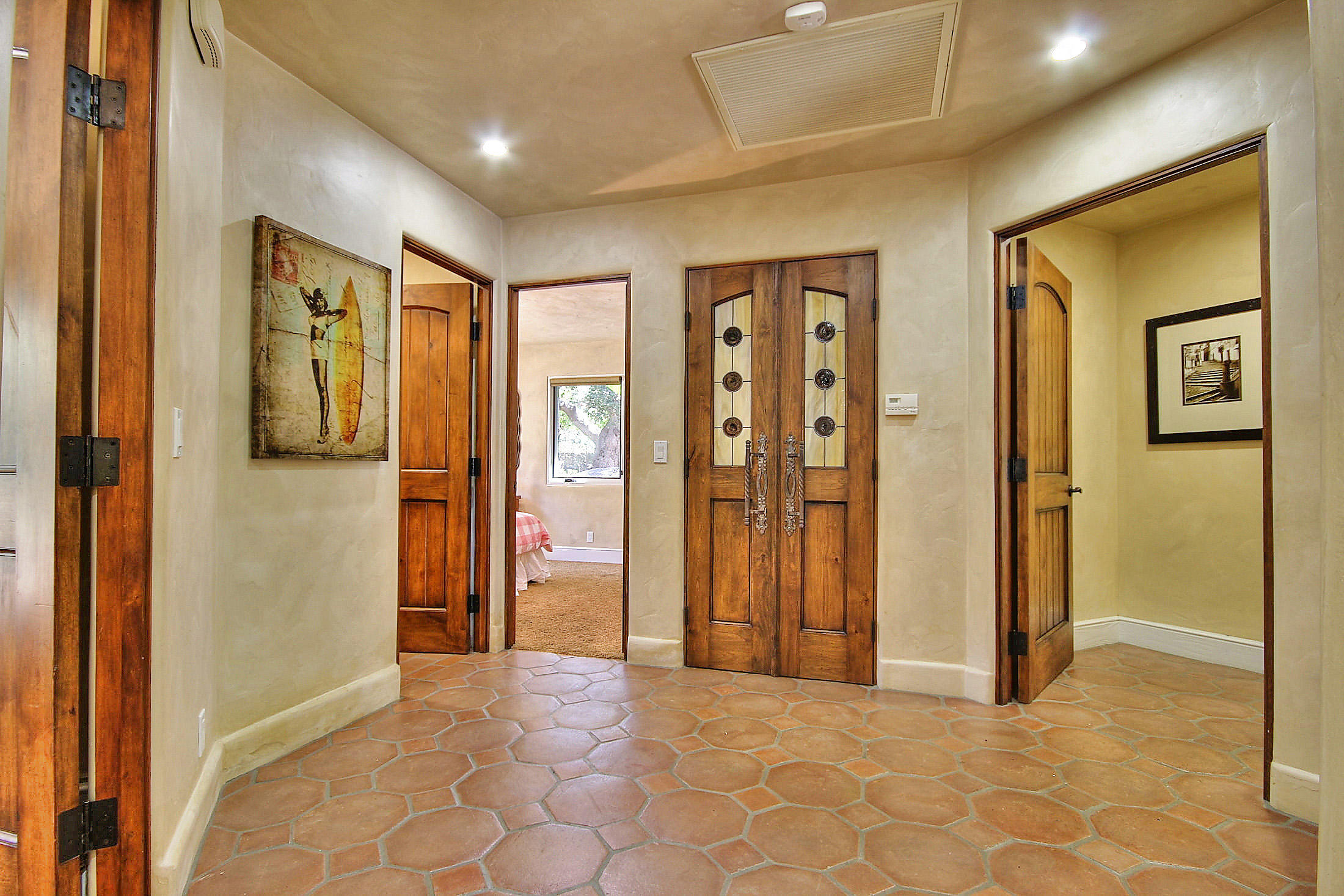 2540 Foothill Road Santa Barbara, CA 93105 - Photo 41 of 45 a view of a hallway with wooden shelves