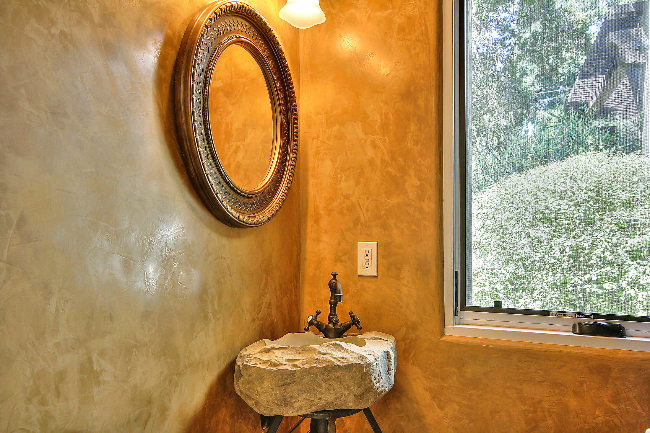 2540 Foothill Road Santa Barbara, CA 93105 - Photo 43 of 45 a bathroom with a sink a mirror and a shower