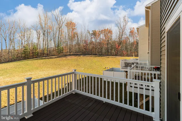 a view of a balcony with an outdoor space