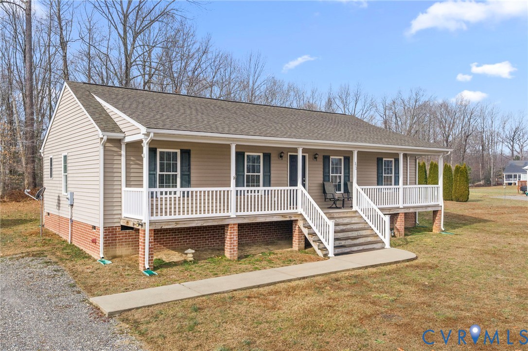 388 Berry Ridge Road Tappahannock, VA 22560 - Photo 1 of 25 a house with trees in the background