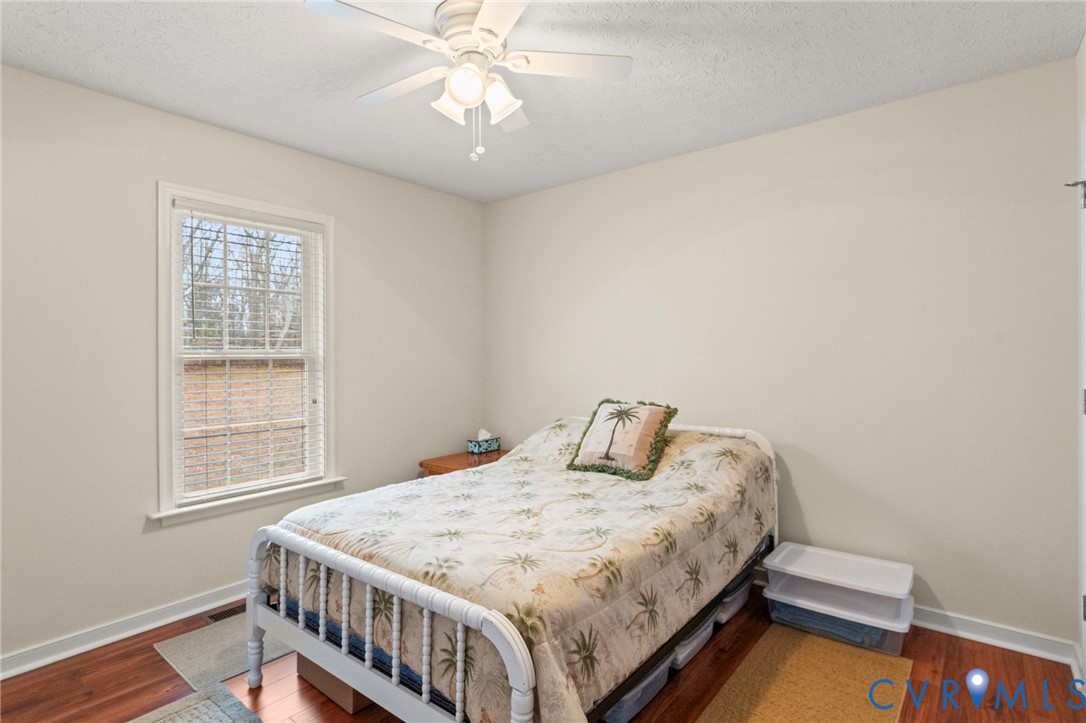 388 Berry Ridge Road Tappahannock, VA 22560 - Photo 13 of 25 a bedroom with a bed and a window