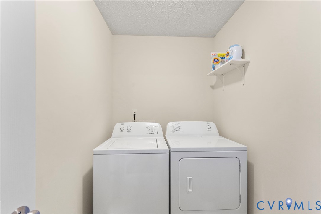388 Berry Ridge Road Tappahannock, VA 22560 - Photo 17 of 25 a utility room with dryer and washer