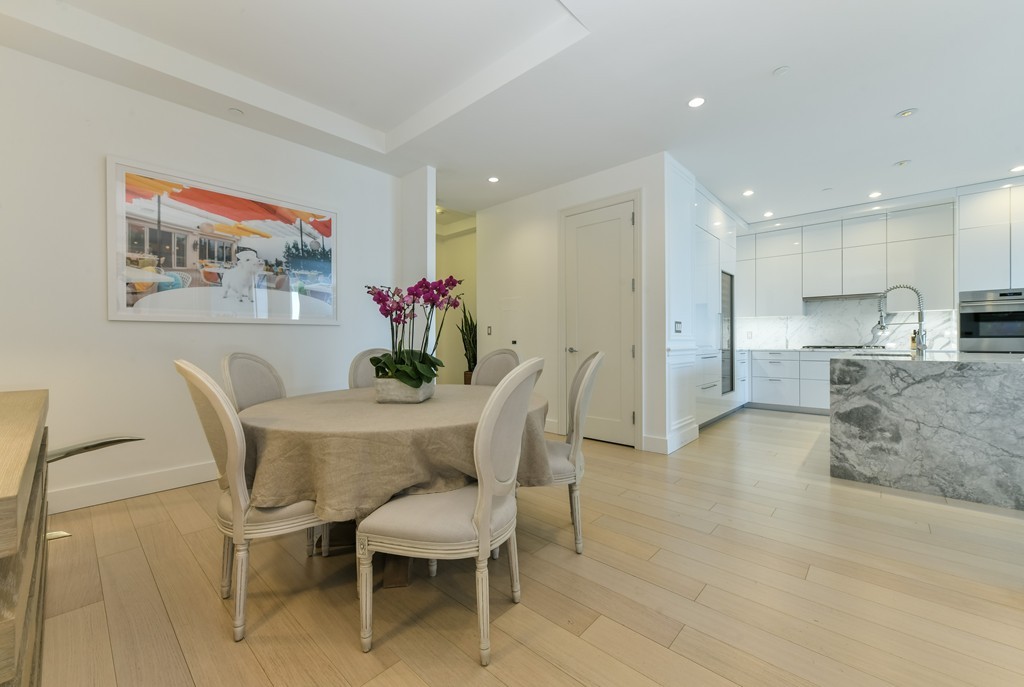 1 Franklin Street, Unit 5201 Boston, MA 02110 - Photo 8 of 23 a dining room with furniture and window