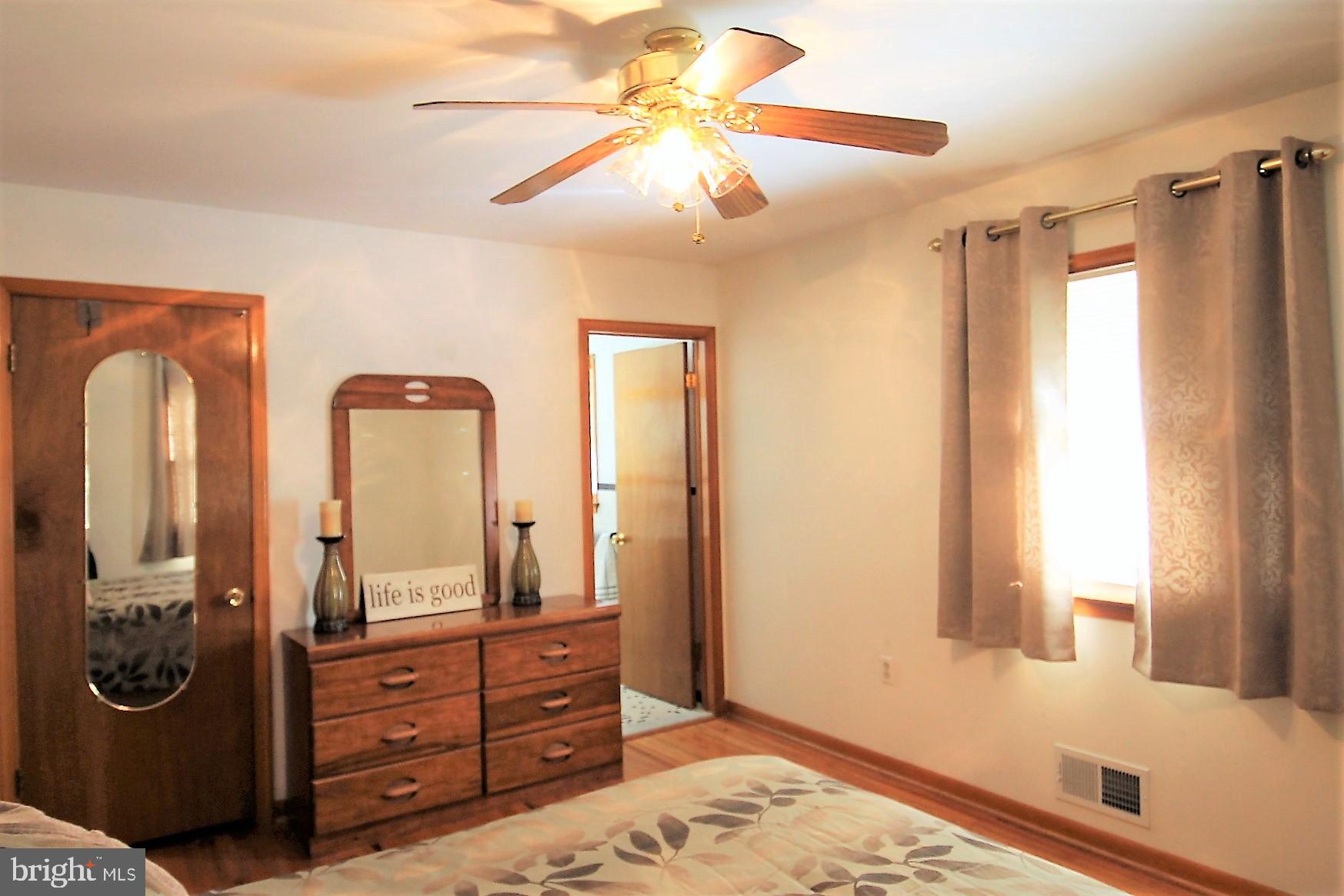 213 Magothy Beach Road Pasadena, MD 21122 - Photo 23 of 39 Primary Bedroom with adjoining bath room