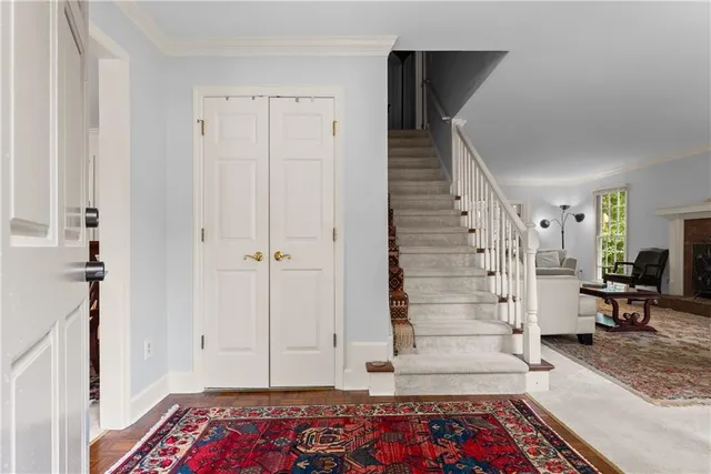 a bedroom with a bed and a table in it