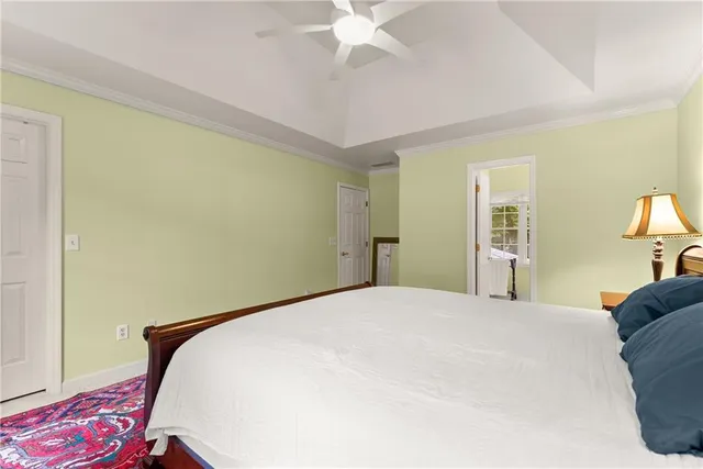 a bathroom with a bathtub and a window