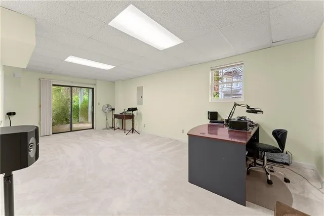 a view of a chairs and table in the balcony