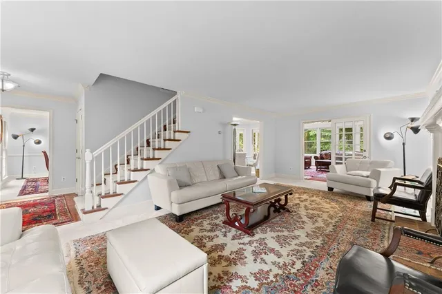 a living room with furniture and a table