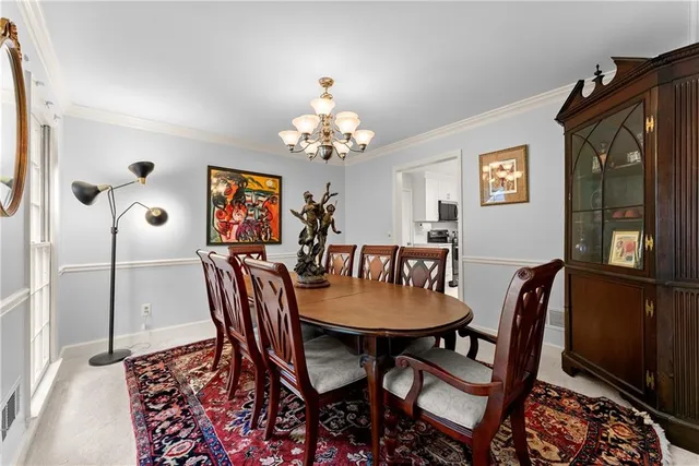a view of a dining room with furniture