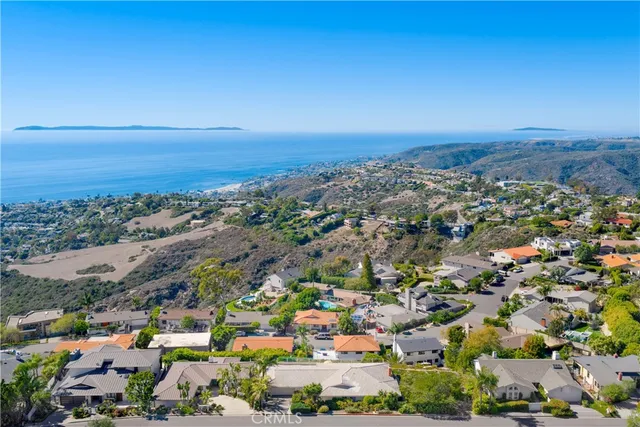 an aerial view of a city with lots of residential buildings