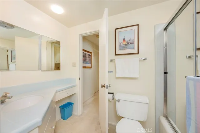 a bedroom with a bed and furniture