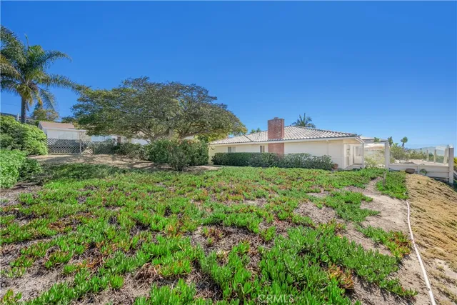 a view of house with outdoor space