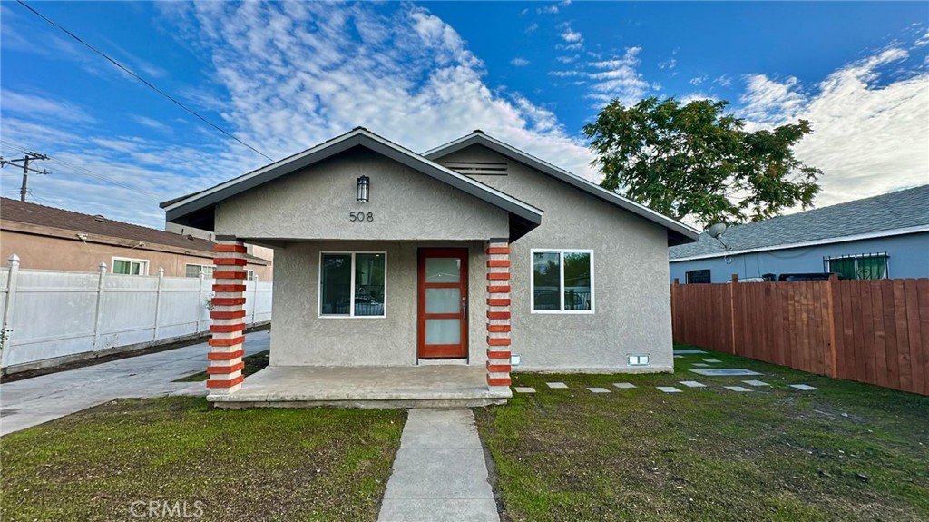 508-508 West Pear Street Compton, CA 90222 - Photo 1 of 14 a front view of house with yard