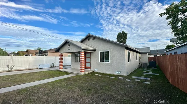 a house view with a garden space