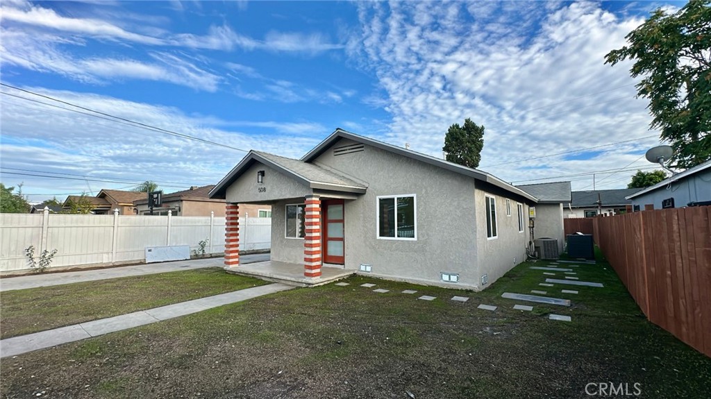508-508 West Pear Street Compton, CA 90222 - Photo 4 of 14 a house view with a garden space
