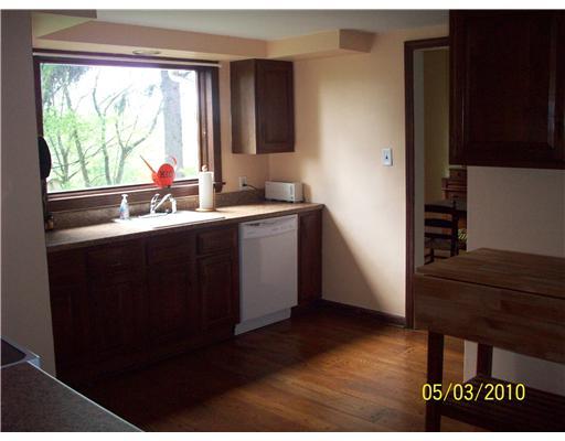 304 Guys Run Road Cheswick, PA 15024 - Photo 7 of 18 Kitchen. Bright and sunny kitchen with large window over sink, new stove, dishwasher, refrigerator, counter tops.