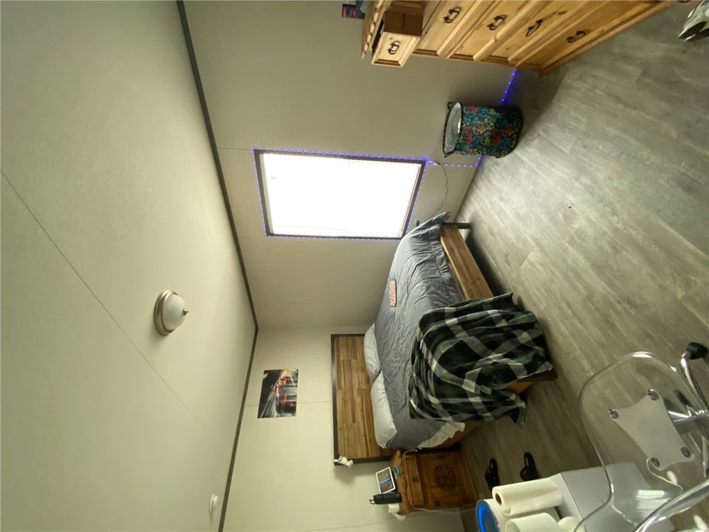 107 Ridgeview College Station, TX 77845 - Photo 14 of 15 a bedroom with a bed and gym equipment