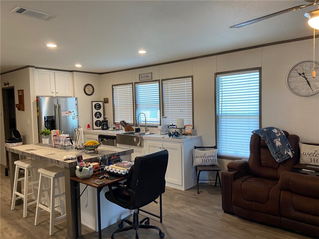 107 Ridgeview College Station, TX 77845 - Photo 15 of 15 a living room with furniture a large window and a table