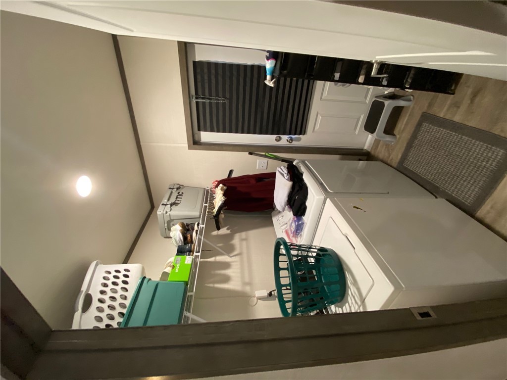 107 Ridgeview College Station, TX 77845 - Photo 5 of 15 a utility room with dryer and washer