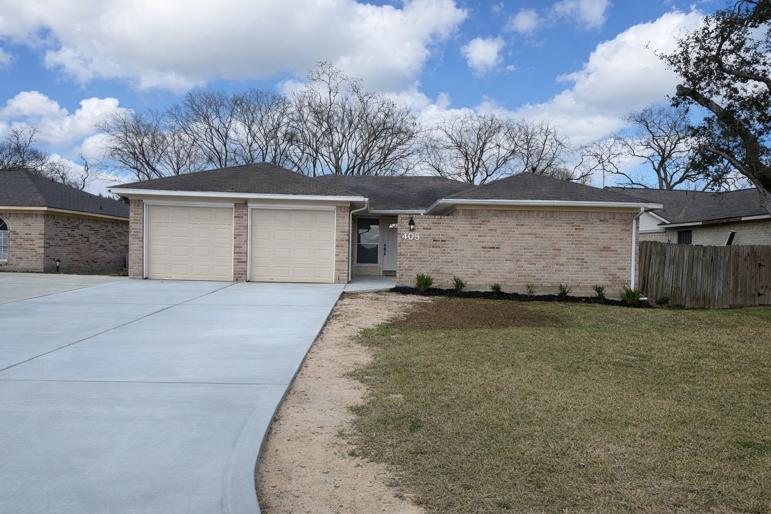 408 Bay Ridge Drive League City, TX 77573 - Photo 22 of 22 front view of a house with a dry yard