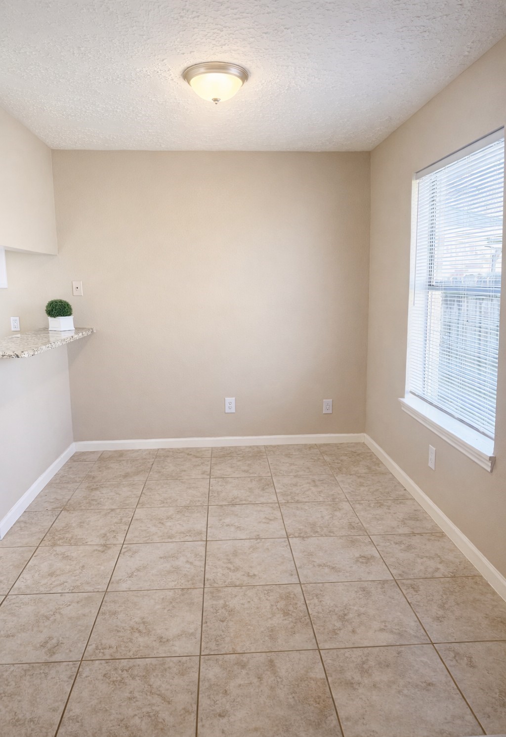 408 Bay Ridge Drive League City, TX 77573 - Photo 5 of 22 a view of an empty room with a window
