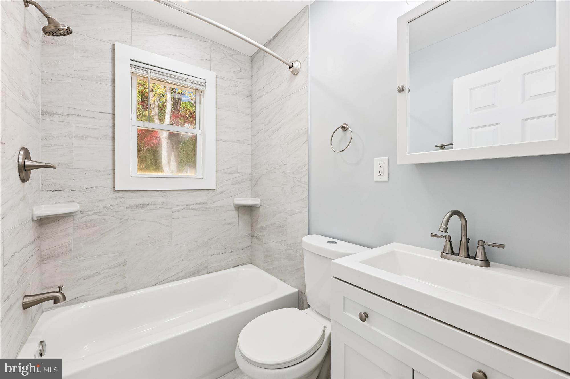 2016 Belfast Drive Fort Washington, MD 20744 - Photo 16 of 61 a bathroom with a sink a toilet and a bathtub