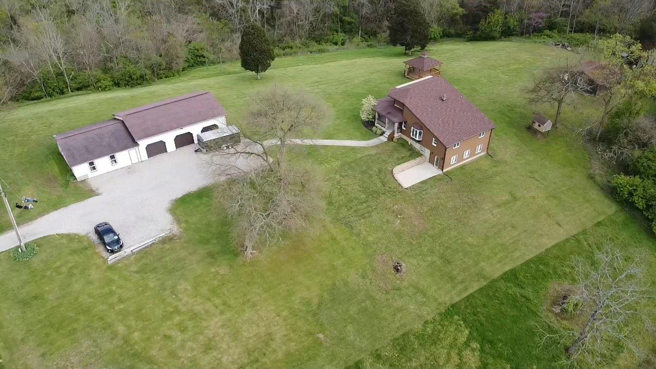7509 Thies Road Rising Sun, IN 47040 - Photo 1 of 78 Seven plus acres of solitary beauty, located on a ridge, surrounded by nature on all sides. At the end of a private drive.