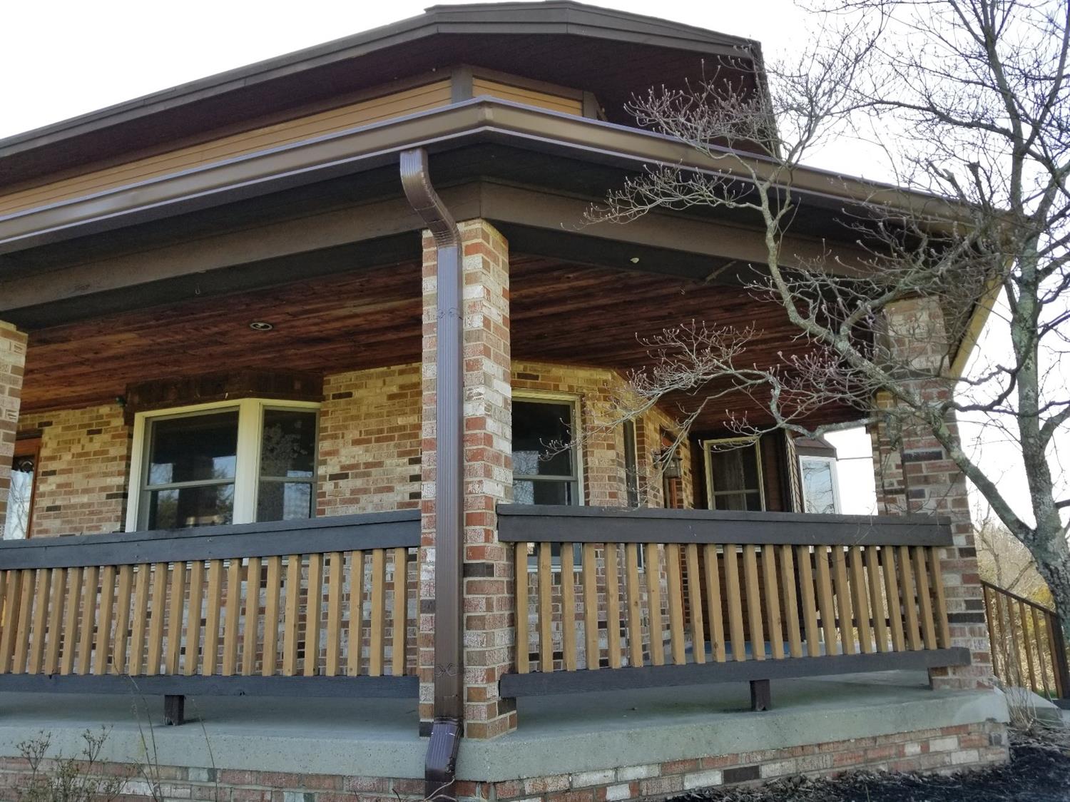 7509 Thies Road Rising Sun, IN 47040 - Photo 10 of 78 Cedar railing and brick facing. What a beautiful combination. Built to be maintenance free!