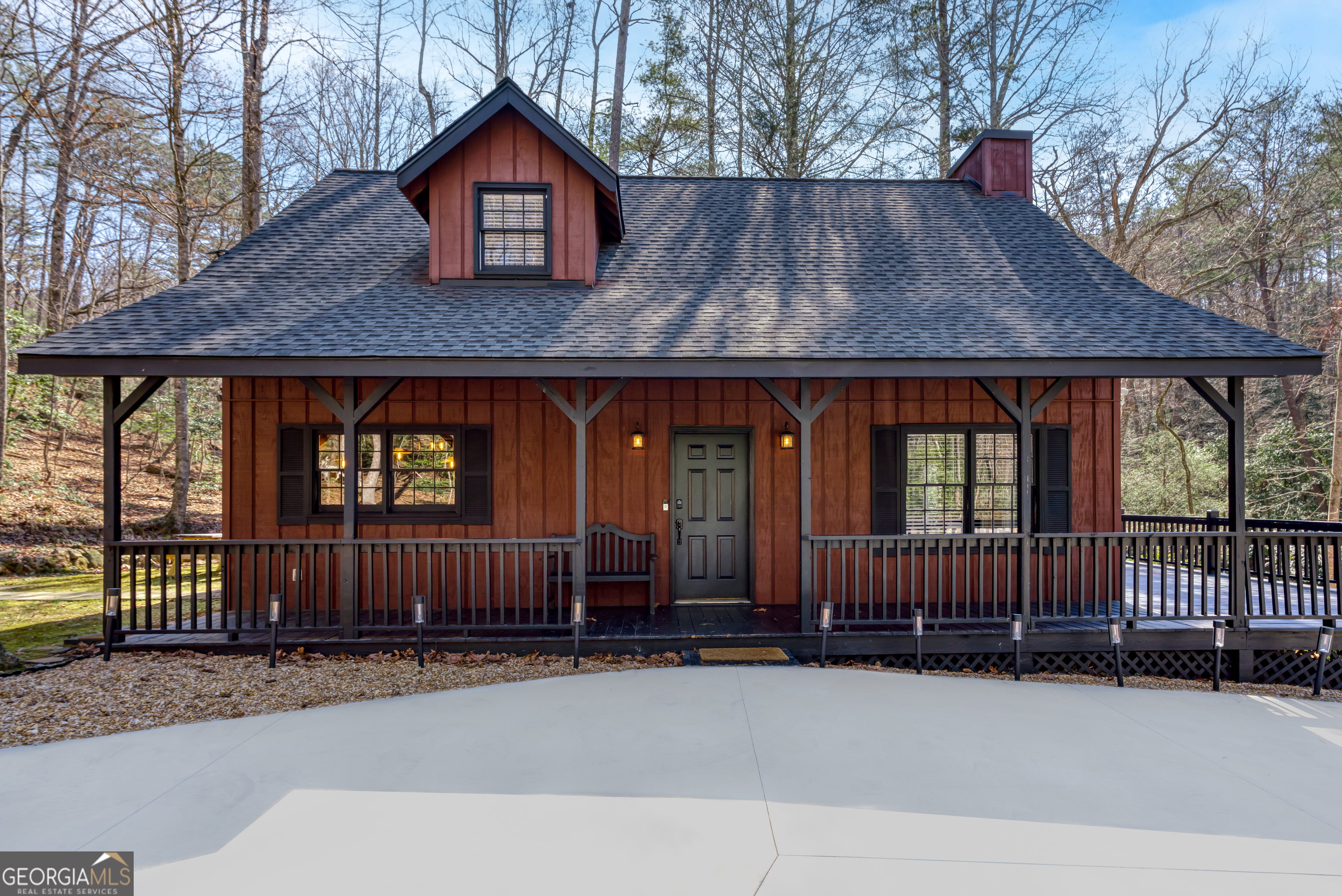 72 Running Deer Road, Unit 4 Cleveland, GA 30528 - Photo 1 of 1 a backyard of a house with sofas