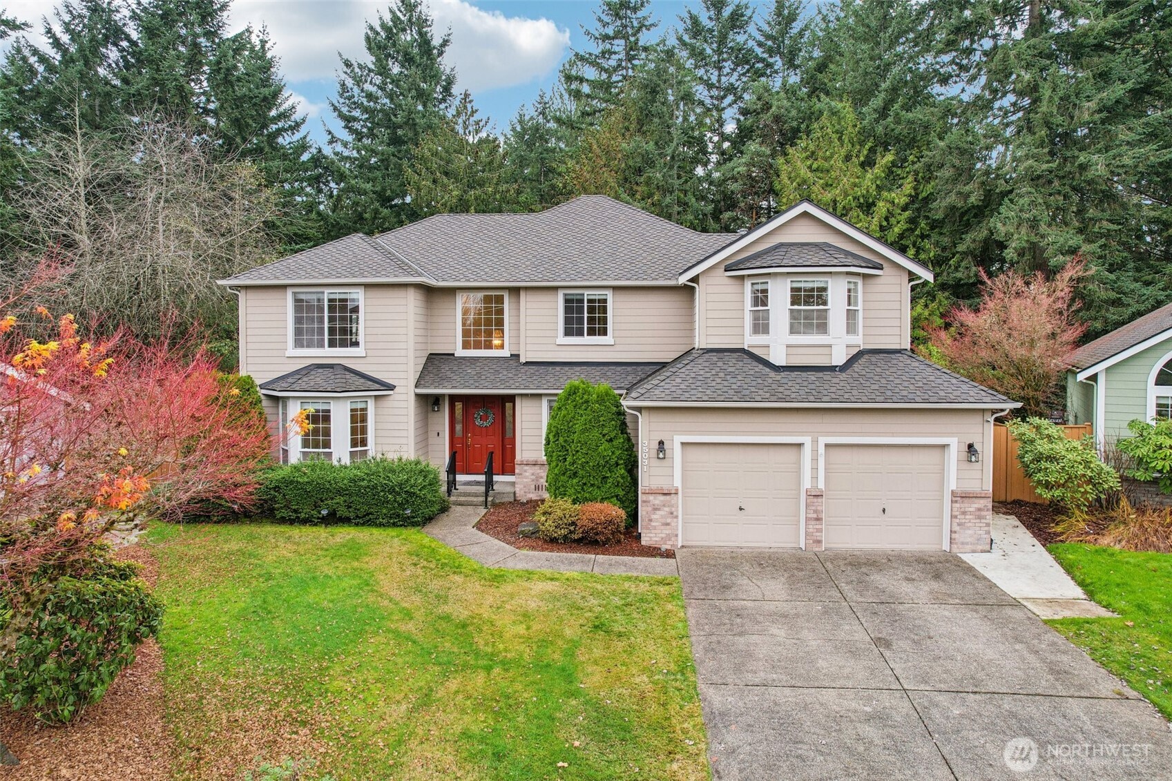 35031 8th Place Southwest Federal Way, WA 98023 - Photo 1 of 36 a front view of a house with a yard and garage