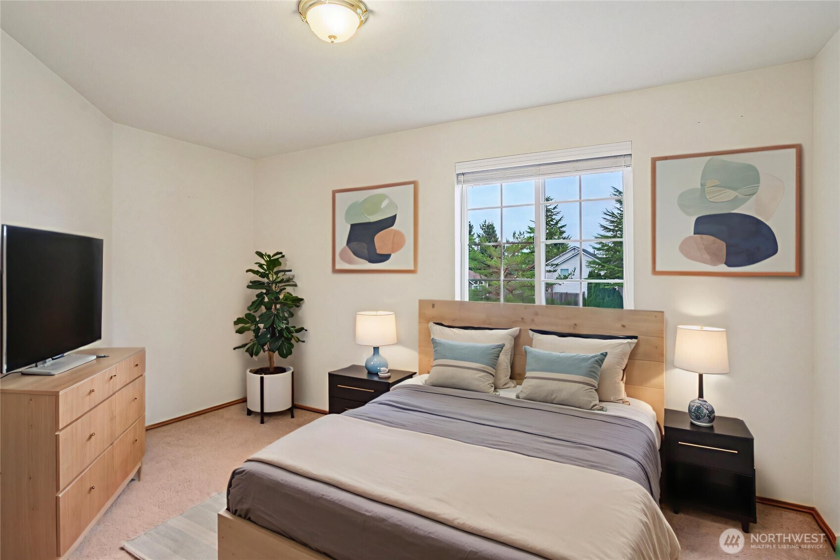 35031 8th Place Southwest Federal Way, WA 98023 - Photo 17 of 36 a bedroom with a bed and a television