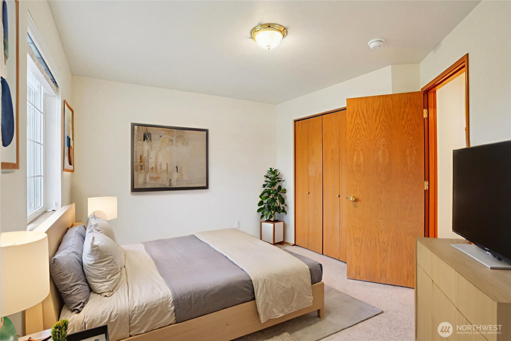 35031 8th Place Southwest Federal Way, WA 98023 - Photo 18 of 36 a bedroom with a bed and a flat screen tv