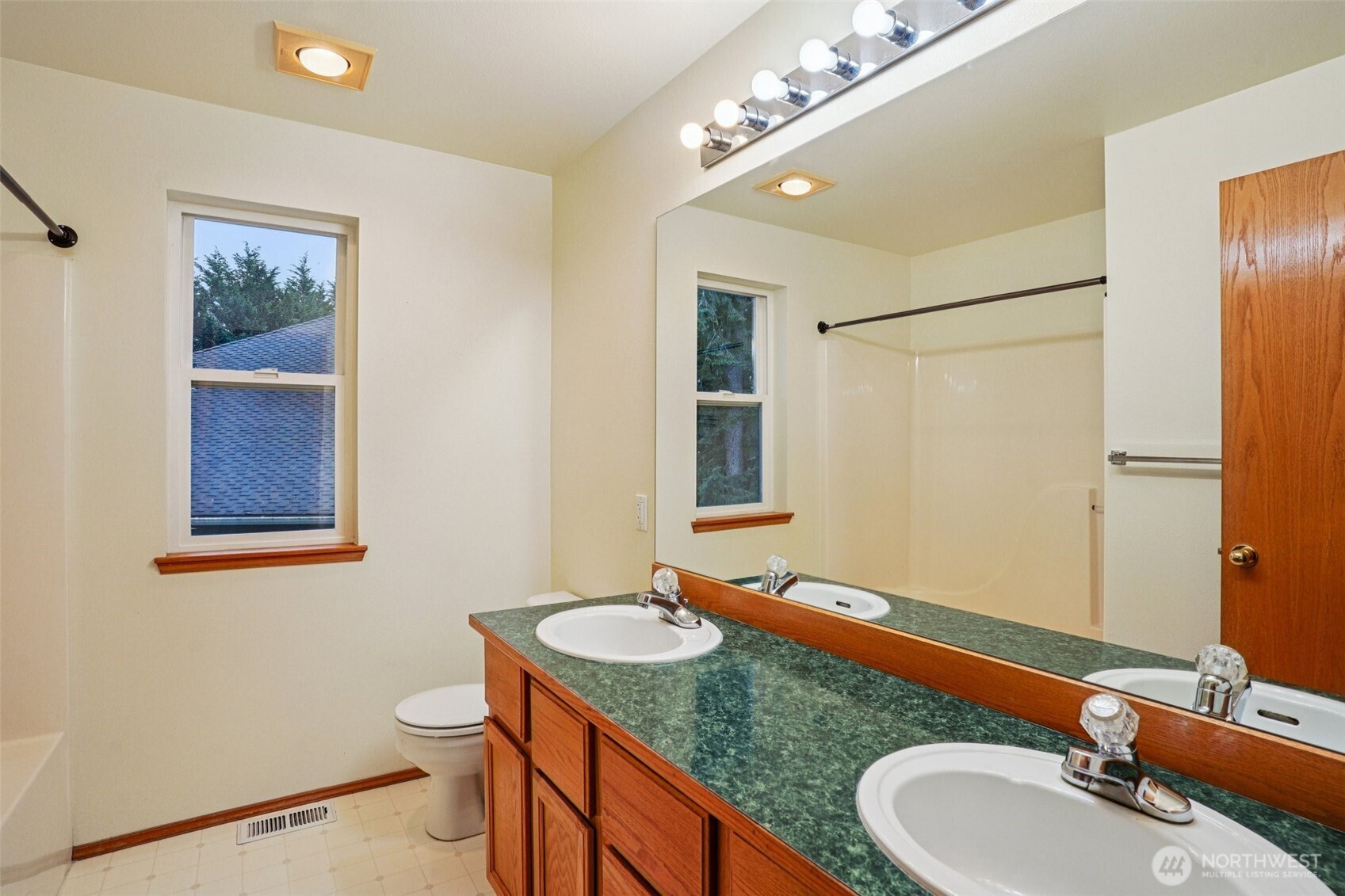 35031 8th Place Southwest Federal Way, WA 98023 - Photo 19 of 36 a bathroom with a granite countertop sink and a mirror